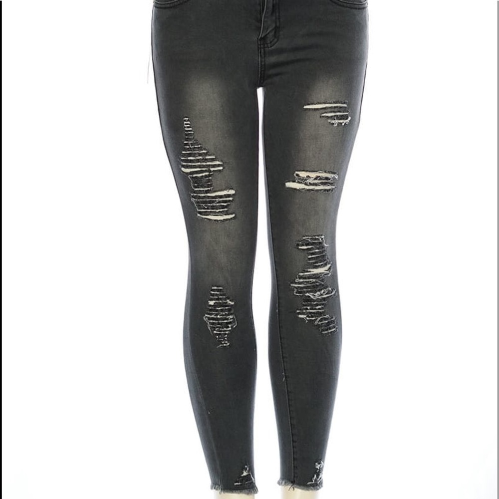 Women’s black distressed jeans